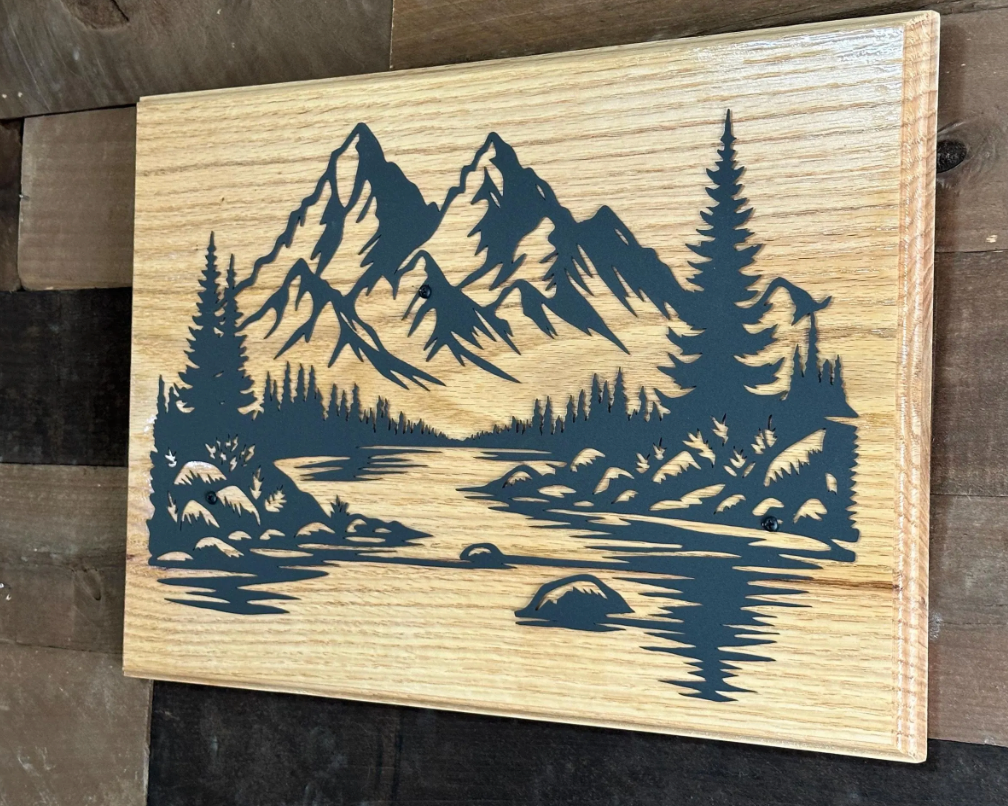Beautiful mountains, handcrafted metal wall art, featuring a black steel landscape silhouette on solid red oak