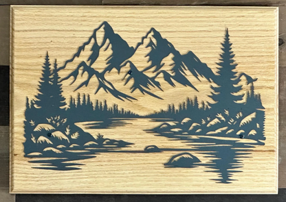 Beautiful mountains, handcrafted metal wall art, featuring a black steel landscape silhouette on solid red oak