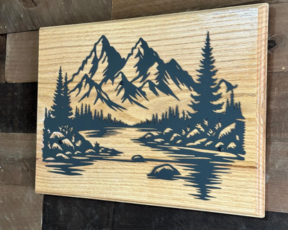 Beautiful mountains, handcrafted metal wall art, featuring a black steel landscape silhouette on solid red oak